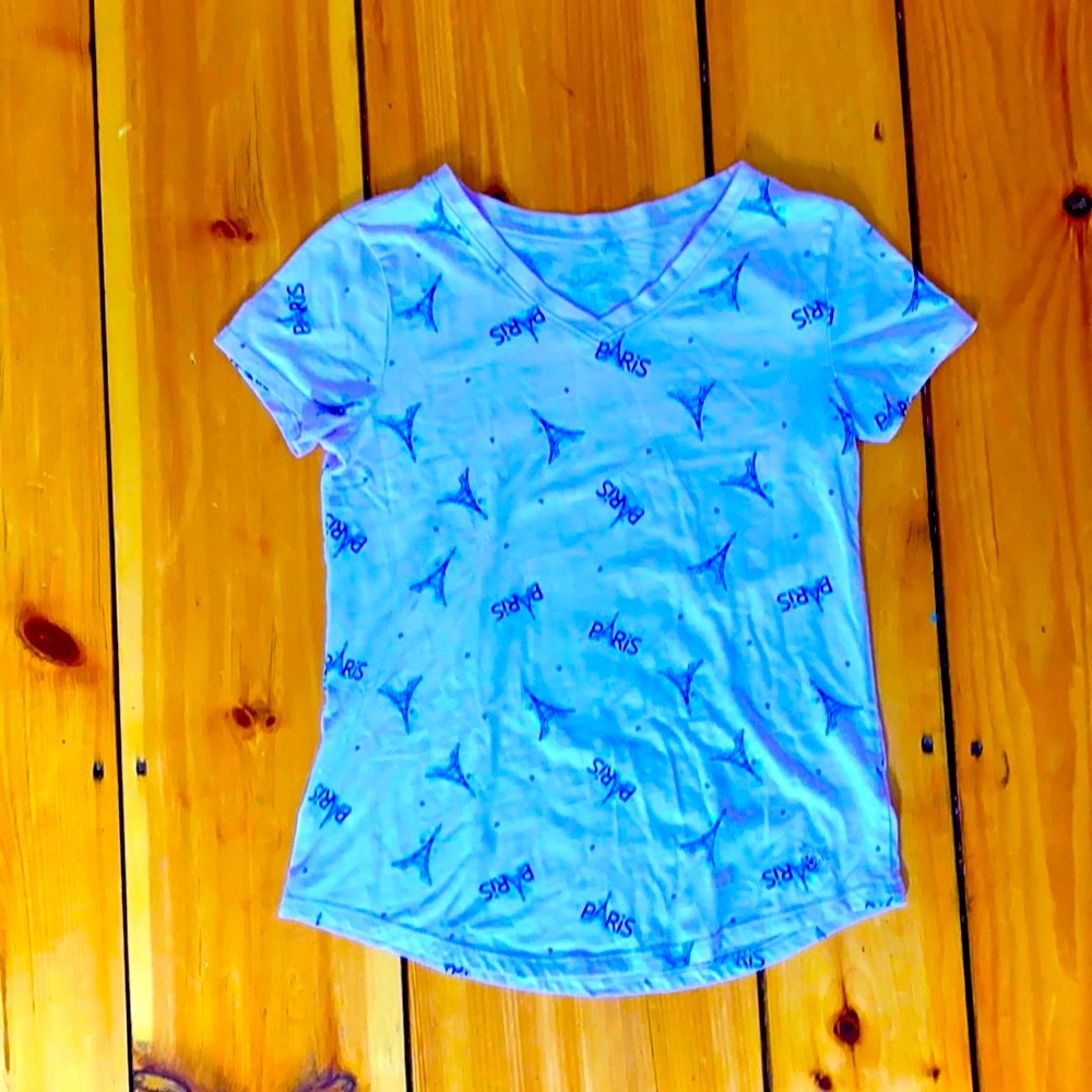 Cute purple t shirt With designs on it